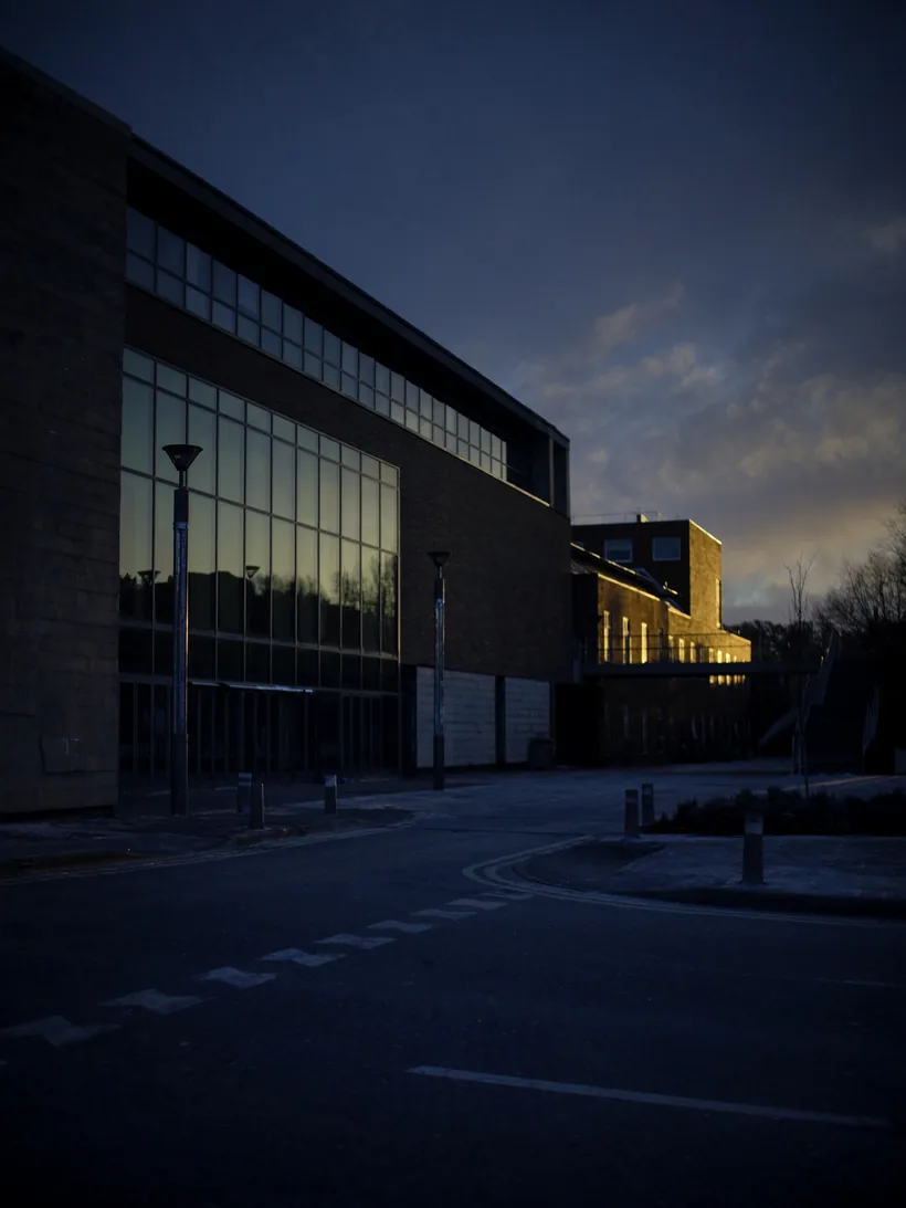 Modern college campus building in the early morning